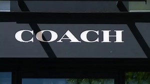 Coach, Michael Kors owners merge in $8.5 bln deal