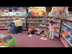 Watch how to sign 'book fair' in American Sign Language.