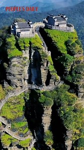 A true castle in the sky! The temple perched on top of Mount Fanjing in SW China's Guizhou, is about 2,570 meters (8,432 ft) above sea level, which is the highest peak of the mountain. | People's Daily, China
