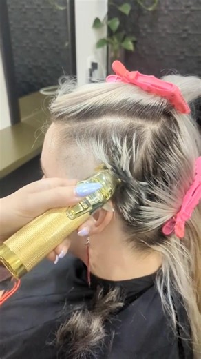 Woman Shaves Her Head Completely Bald With Electric Clippers