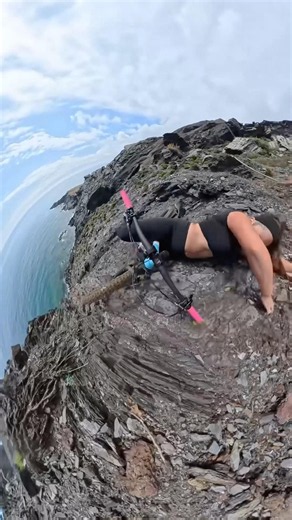 Biker falls off the cliff