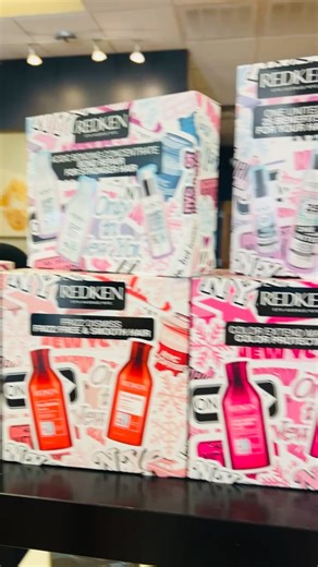 Our Redken boxed sets are officially HERE — packed with your favorite formulas targeted to protect color, recover from damage, or boost strength and shine. Hair care that works (and saves you $$ 😉). Grab yours at your next appointment… or stop in before they’re gone! #SelfCareEssentials #HairGoals #redken #SalonFavorites | Lavish Salon