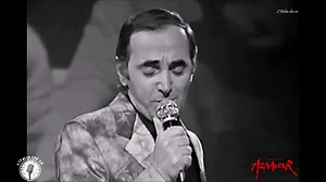 Charles Aznavour - "Lei" (She) (G. Calabrese-H. Kretzmer-C. Aznavour) 1974 Tous les visages de l'amour, è il titolo originale di questo brano che Aznavour inciderà in inglese (She), in spagnolo (Ella), in tedesco (Sie) ed ovviamente in italiano. Il brano è arioso, ben interpretato e sicuramente valido. Onestamente non so se quanto riportato sulla copertina italiana del disco (ovvero che il disco è al primo posto nelle classifiche di tutto il mondo) sia rispondente a realtà. Di sicuro il 45 giri 