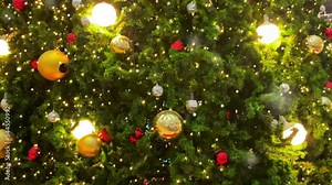 Animated Christmas tree with falling snowflakes .Christmas tree made animated particles. Christmas mood. Glittering effect.