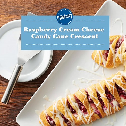Celebrate the holidays with a Raspberry-Cream Cheese Candy Cane Crescent that's easy and fun to make. Wrap fresh raspberries and cream cheese in Pillsbury Crescent Rolls for a decorative dessert that's perfect for all of your festivities this season. Get the recipe at: https://www.pillsbury.com/recipes/raspberry-cream-cheese-candy-cane-crescent-danish/0955e788-f3fa-4026-a8e9-5dc26ec131ac?utm_source=facebook&utm_medium=social_organic&utm_campaign=pb-kbs&mktgimp=pbrbgcrescnt | Pillsbury