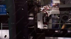 modern manufacturing industry.technological process.production of plastic ware.thermoplastic on an automated line produces plastic cups.close-up.shallow depth of field Stock Video