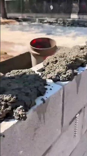 The process of applying mortar to concrete structures with structural reinforcement #construction