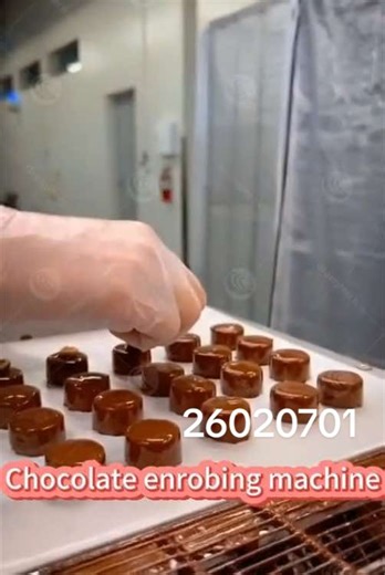 Chocolate coating machine. Please contact us if you need chocolate equipment.#Chocolate #factory #Chocolatemachine