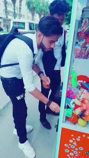 Claw Machine Challenge: How to Win Colorful Plush Toys