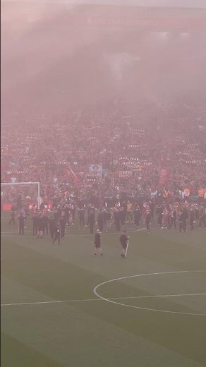 Players singing YNWA with the fans after the final whistle
