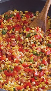Maque Choux is a classic Cajun recipe of corn and peppers sautéed in bacon grease until softened and spiced with a blend of Cajun seasonings. It’s an outstanding Southern side dish. 😎 GET THE RECIPE: https://www.chilipeppermadness.com/recipes/maque-choux/ | Chili Pepper Madness - Recipes & More from a Gourmet Chilihead