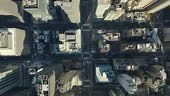 Aerial birds eye overhead top down view of streets crossing avenue....