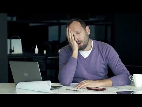 Tired man yawning after work stock video | man yawning stock footage | Yawning copyright free video