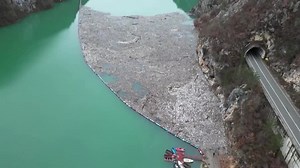 Bosnian river's floating waste dump threatens health, tourism
