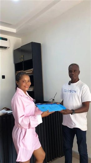 Handing Documents Over To Our Clients.