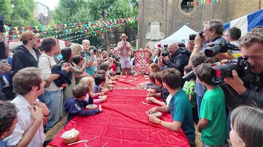 The spaghetti eating contest at this years Soho Fete held in Soho in the West End of London