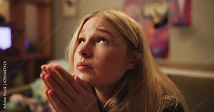 Hope, hands and woman in a house praying for help, depression or solution closeup. Pray, worship and female person at home with prayer to Jesus Christ for mercy, praise or asking for anxiety support