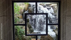 4K Window traditional chinese lattice grid with river in garden of Taiwan. Taichung seaport art center as a performing arts, fine arts and cultural promotion. Traditional Chinese House-Dan