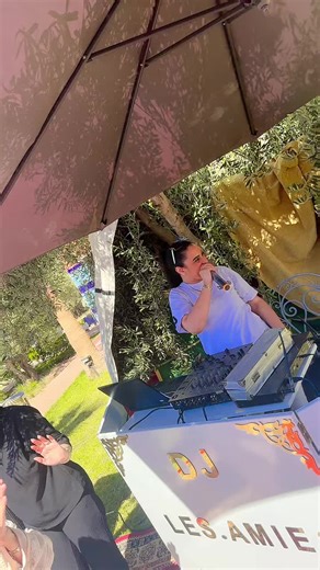 DJ Setup in Outdoor Party Scene with Equipment