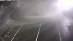 Have you ever seen anything like this? A tornado funneled across an Auglaize County school's parking lot, directly in front of their security camera, providing a view nearly inside of the twister: https://bit.ly/2KdL93D | WHIO