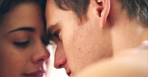 Intimate Young Couple Foreheads Touching Close Up