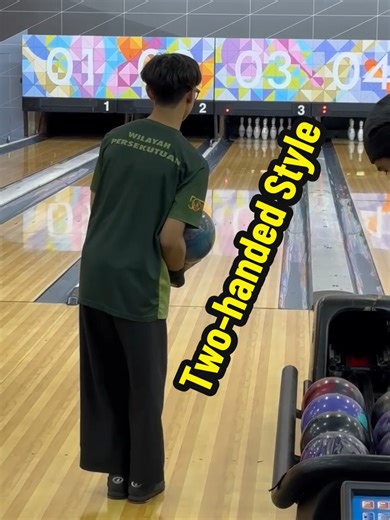 Mastering the Two-Handed Bowling Style