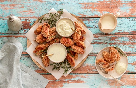 Try this irresistible crowd pleaser: Buttermilk chicken wings with 2 dairy dips. It is quick and easy to prepare if you marinate the chicken wings in buttermilk ahead of your prep time. The result is crisp and tender oven-baked wings served with citrus maas and creamy blue cheese dips - perfect for picnics, a day at the beach, a party platter or starters at a braai. You can also use maas instead of buttermilk – both work well and can be used interchangeably. Recipe below: Ingredients Buttermilk
