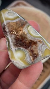 7.4K views · 255 reactions | This agate was opened, shaped, and fully rounded on the flat lap — then slowly polished until the banding revealed itself. No rushing. No forcing the stone. Every piece finds its own final form 懶 #StoneBornCreations #Agate #Lapidary #StoneArt #RockPolishing #OneOfAKind | StoneBorn Creations | Facebook