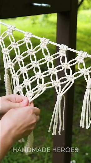 Couple builds dream wooden pergola with macramé hammock for their garden🧡