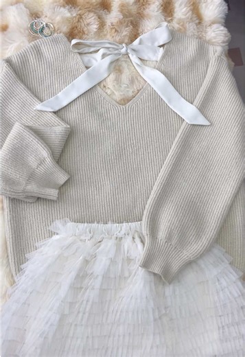 Capture New Year Moments with Stylish V-Neck Sweater