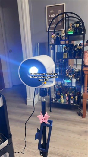 The easiest Halloween decor! #halloween #spookyseason #projector #windowprojector #decor