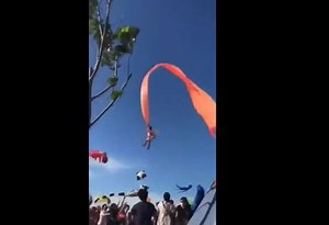 OMG! Watch as little girl is pulled into the sky by giant kite