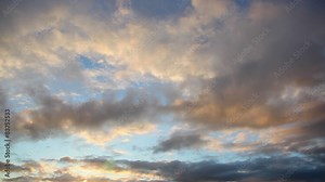 Clouds Gliding Through Dusk Sky Just after Sunset