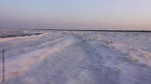 Solar salt at the salt-producing site, salt-industry, saltworks on self-settling salt lake