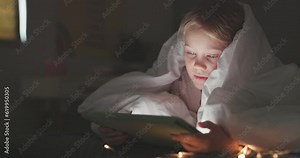 Blanket, girl and tablet in bedroom at night for online games, reading ebook story or elearning app. Young child relax on digital technology, connection or streaming cartoon entertainment in the dark