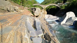 Double arch stone bridge at Ponte dei Salti with waterfall, Lavertezzo, Verzascatal, Canton Ticino