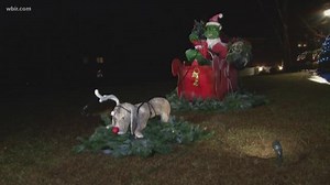 Life-Size Grinch Yard Display Brings Christmas Cheer
