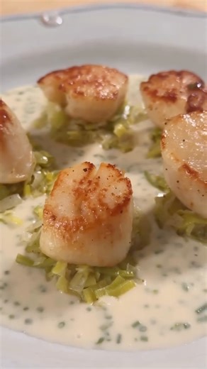 Frog Leg Pudding | Skip the restaurant. Cooking is more romantic 💕 Second course: Pan-seared scallops with leeks and chive beurre blanc. Caramelize leeks in... | Instagram