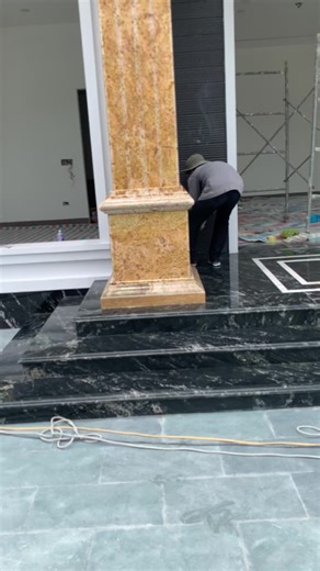 Ornate Marble Column Renovation in Progress