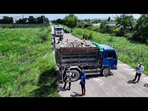Fantastic Activities Landfill Start project By Best Skill Dozer KOMATSU D31A & Trucks unloading soil