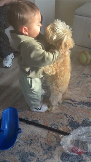 Baby's Dance Moves Accidentally Squeeze Dog