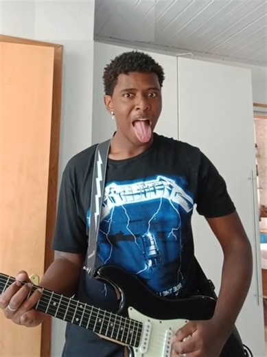 Eddie Munson Celebrates Passion for Music and Guitar