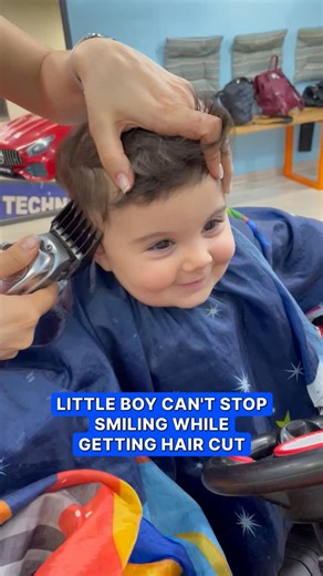 Daily Mail on Instagram: "He's having a great time! #aww #cute #kid #haircut"