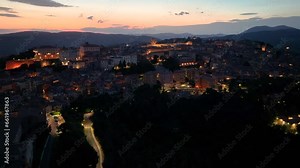 Perugia historic center from above, night evening view of Piazza IV Novembre, Fontana Maggiore, Palazzo dei Priori, and San Lorenzo Cathedral, Umbria, Italy