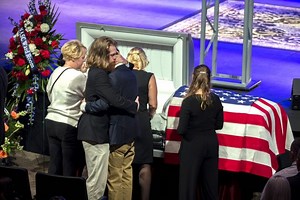 Hundreds Attend Funeral for Navy Sailor Slain in Base Attack