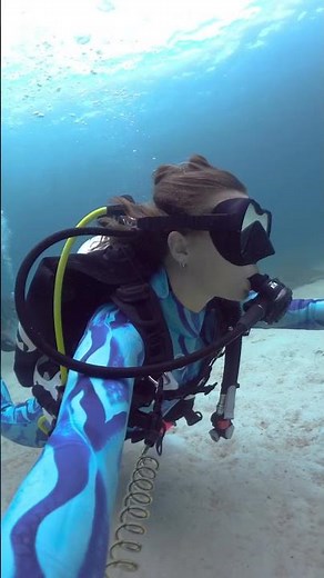 The Scuba Girl just being happy on a fun dive in her beautiful wetsuit from BLODE WETSUIT in Koh Tao