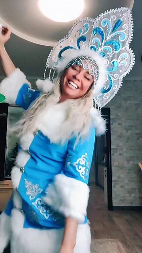 Stunning Blue Costume Performance with Elaborate Headdress