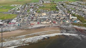 An aerial view of Lahinch, or Lehinch, a small town on Liscannor Bay, on the northwest coast of County Clare, Ireland. The town is a seaside resort and has become a popular surfing location.