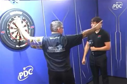 Darts star risks fine with incredible act of sportsmanship to rival