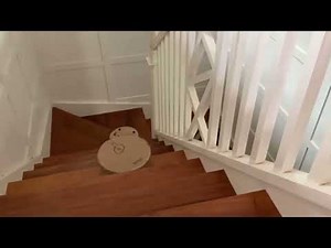 2 minutes and 38 seconds of roombas falling down stairs